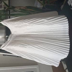 White pleated skirt.